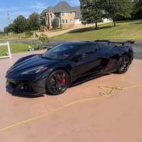 Black sports car with a clean gloss finish