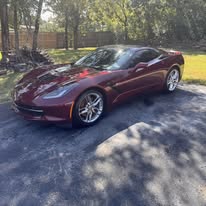 Red sports car detailed outdoors